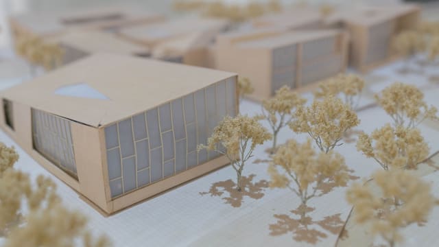 white and brown building miniature