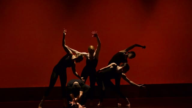 group of people performing on stage