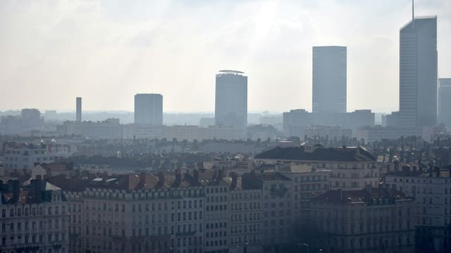A view of a city with tall buildings