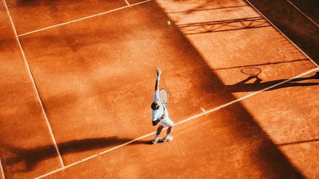 man playing tennis