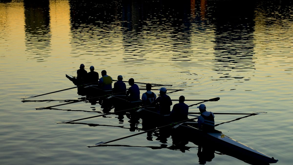 men rowing boat