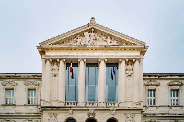 The historic Palais de Justice in Nice, showcasing classic French architectural design.