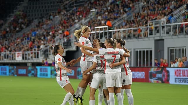 girl soccer group on soccer field